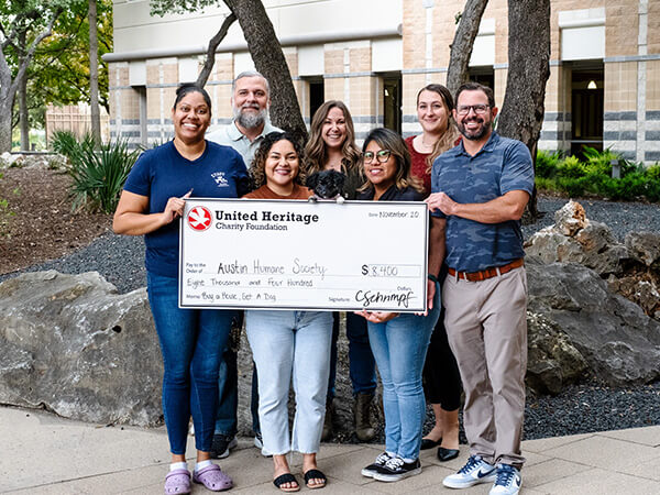 United Heritage Credit Union Donates $8,400 to the Austin Humane Society Through “Buy a House, Get a Puppy” Campaign