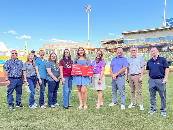 Check presentation to Lauren Smets at Dell Diamond in Round Rock, TX.