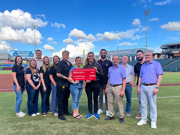Check presentation to Michael Vangeli at Dell Diamond in Round Rock, TX.