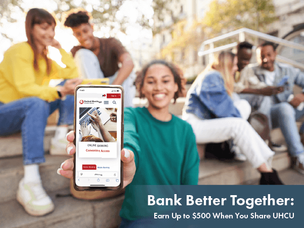 Group of friends with one in focus holding phone