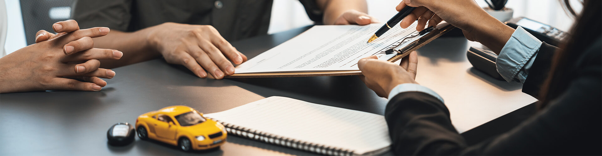 signing paperwork on auto loan