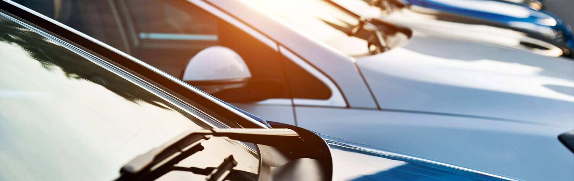 hoods on a car lot