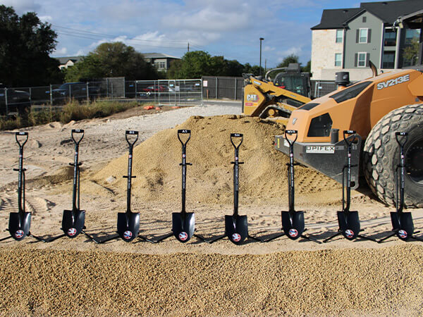 Shovels on mound of dirt at the Parmer Branch construction site