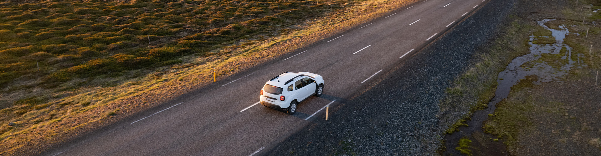 car driving down the road