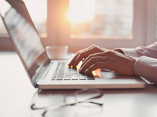 Hands on laptop